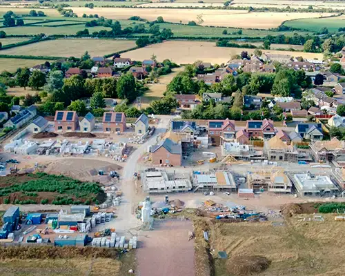 Aerial shot of zero carbon homes at St George's Mead, Semington by Newland Homes